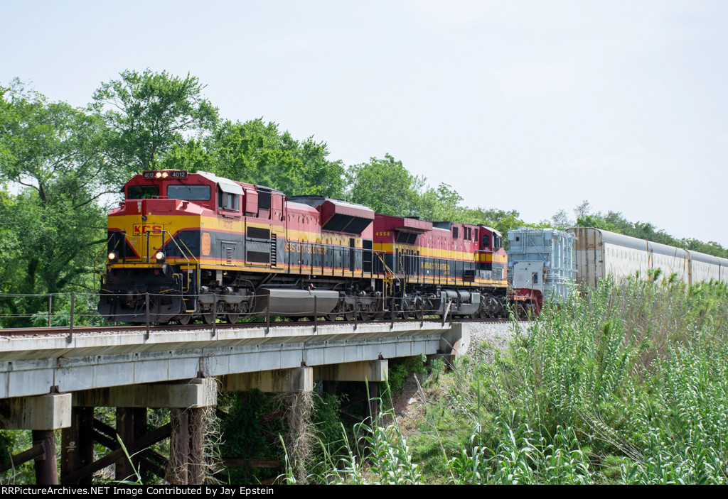 KCS 4012 crosses a small bridge north of Inez